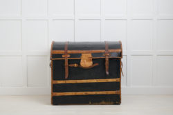 Antique leather travel trunk. The leather is marked with the name Beaumont and the street 93 rue du BAC in Paris