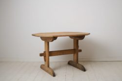  Swedish folk art table from the early 1800s. Trestle table, meaning an early primitive type of table with a loose table top on a leg frame.