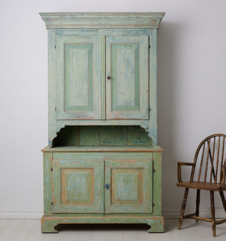 Rare Swedish antique cabinet, a genuine country house furniture in gustavian style from northern Sweden. The cabinet is made by hand in solid pine around 1840 to 1850