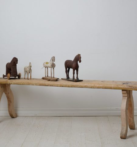 Antique folk art bench from Sweden made around 1820. The bench is made by hand in solid pine and has never been painted