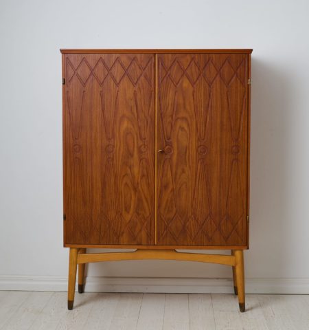 Swedish modern teak cabinet ”Rickard” designed by Kirke Nielsen and made by Abrahamssons Möbelfabrik in Smålands Taberg.