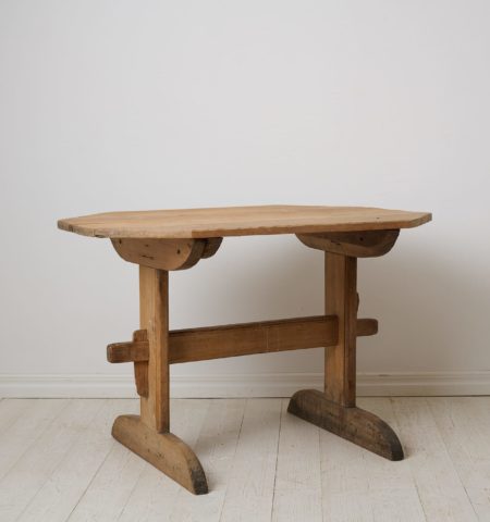  Swedish folk art table from the early 1800s. Trestle table, meaning an early primitive type of table with a loose table top on a leg frame.