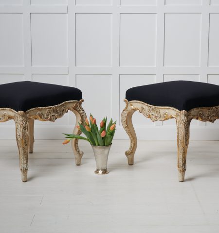 Pair of large upholstered stools in rococo style made during the rococo revival in the late 19th century. The stools are unusually large