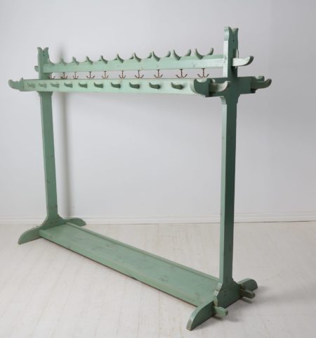 Antique unique clothes rack made by hand from northern Sweden. The clothes rack is made around the year 1900 in painted pine