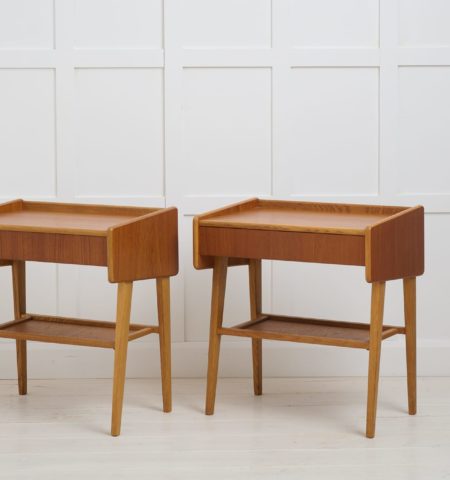 Vintage Scandinavian teak nightstands, with a single drawer and shelf underneath. The pair is made in Sweden around 1960. Good vintage condition