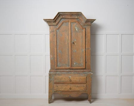 Small antique country cabinet from northern Sweden. The cabinet is a genuine country house furniture made in Jämtland in Sweden around 1820