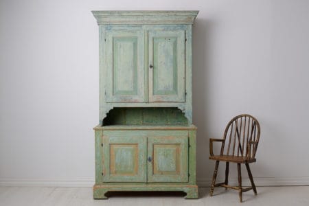 Rare Swedish antique cabinet, a genuine country house furniture in gustavian style from northern Sweden. The cabinet is made by hand in solid pine around 1840 to 1850