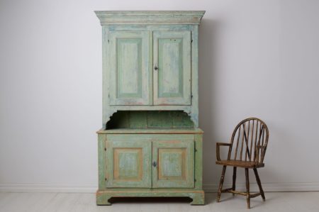 Rare Swedish antique cabinet, a genuine country house furniture in gustavian style from northern Sweden. The cabinet is made by hand in solid pine around 1840 to 1850